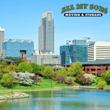 downtown omaha buildings overlooking a pond