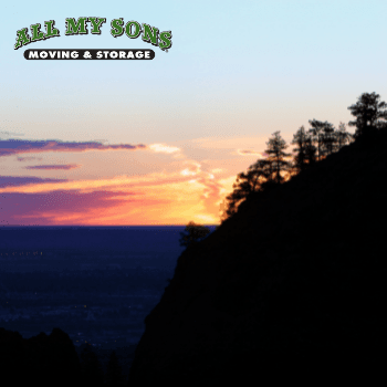 Sunset shines off the side of the Rocky Mountains