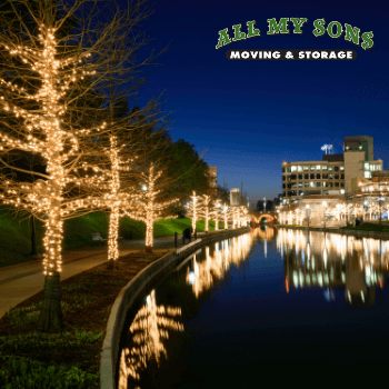 A canal in The Woodlands lit up with holiday lights