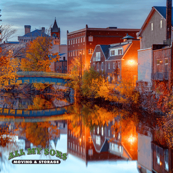 buildings and homes along a river in stoneham, massachusetts